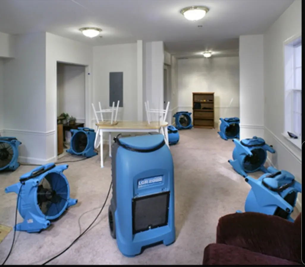 Air movers and dehumidifier setup for Water Damage Restoration in Chestertown